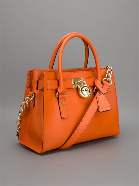 michael kors handtas oranje